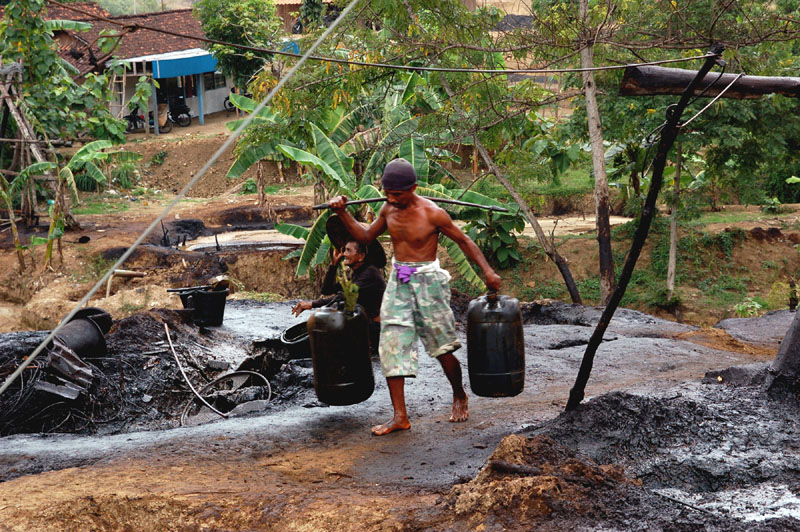 carying the mined oil