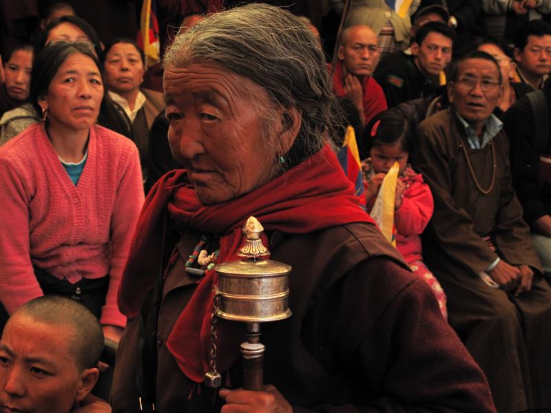 Elderly Tibetan woman at the monastery in Dharamsala.