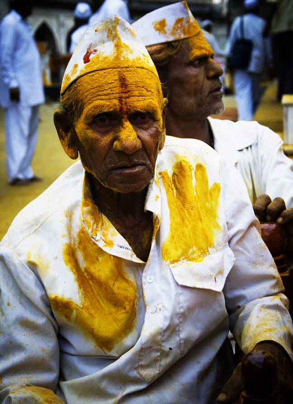 Devotee performing  religous rituals  during in festival  at Jejuri tample