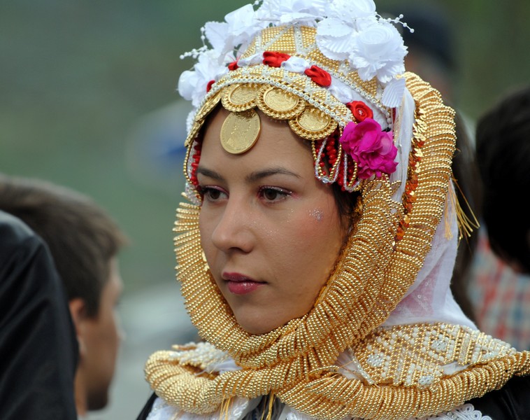 Young Gorani woman in traditional costumes.