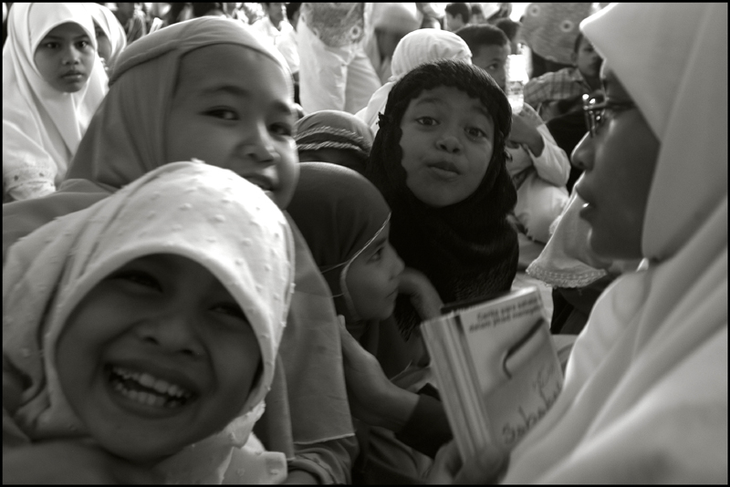 A student (right) from the Fajar Hidayah organization with some girls at an orphanage in Banda Aceh Indonesia