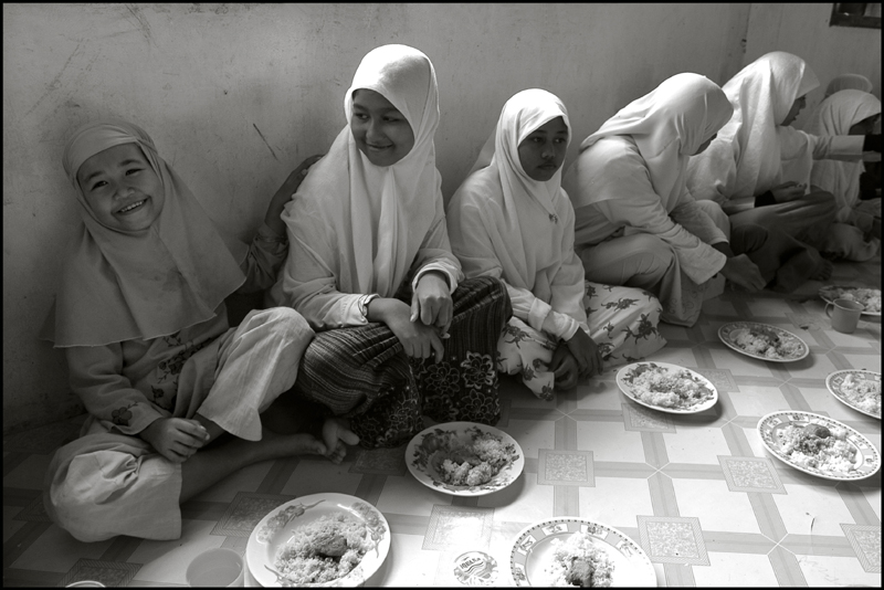 Girls having their lunch at an orphanage in Banda Aceh Indonesia