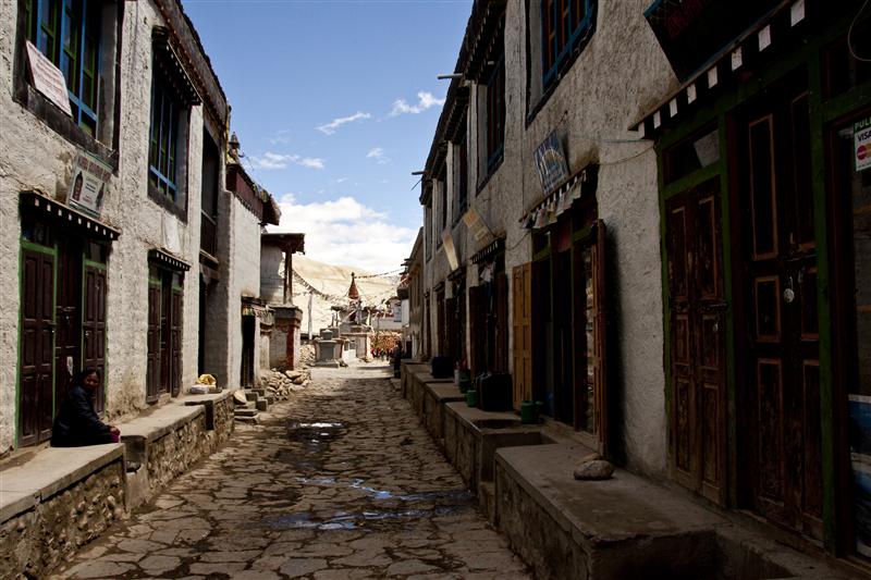 One of the main streets in the village of Lo Manthang, in a place where over 700 residents live inside and outside of the walls of Lo Manthang, Upper Mustang