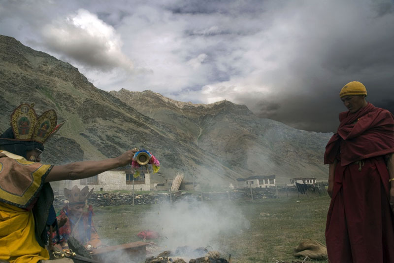 A monk and a Tibetan witchdoctor praying together in Changthang plateau.