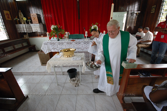 Baptise Ceremony in one village's Roman Catholic Church : Suriname