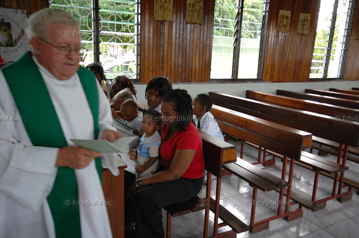 Baptise Ceremony in one village's Roman Catholic Church : Suriname