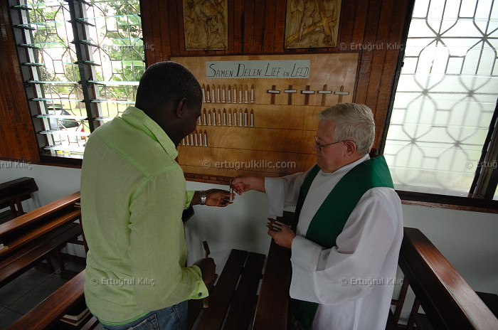 Baptise Ceremony in one village's Roman Catholic Church : Suriname