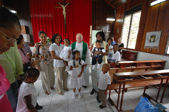 Baptise Ceremony in one village's Roman Catholic Church : Suriname