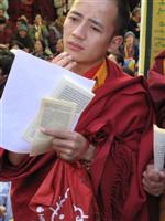 A monk read the Dalai Lama's message at the 50th Tibetan Uprising anniversary