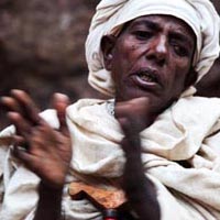 Woman singing during Genna, Lalibela, Ethiopia