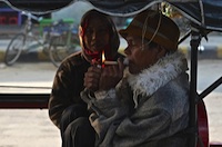 Man lights a cigarette