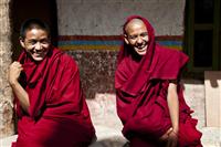 Young monks laugh over a joke made by one of the other monks in the moastic school in Tsarang