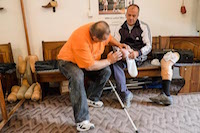 Muris Cizmic is fitted with a new prosthesis at the Orthopedic Workshop in Zavidovici