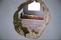 Bedroom Hole inside of a bombed house, Koleile, Lebanon