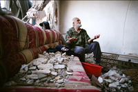 Mustafa inside of his house, Maroun En Ras, Lebanon