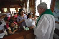 Baptise Ceremony in one village's Roman Catholic Church : Suriname Baptise Ceremony in one village's Roman Catholic Church : Suriname