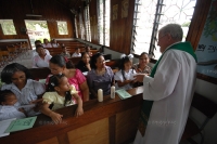 Baptise Ceremony in one village's Roman Catholic Church : Suriname